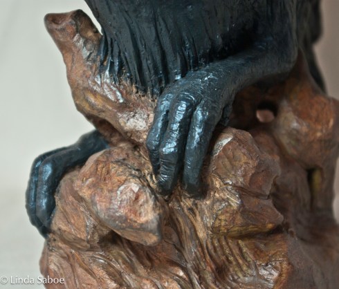 Ceramic clay, black iron oxide wash finished with pigmented wax patina.